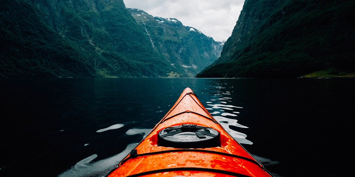 Kayak in the Water With Mountain Views